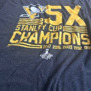 This is a Pittsburgh Penguins Stanley Cup Champions 5-Time T-Shirt in gray